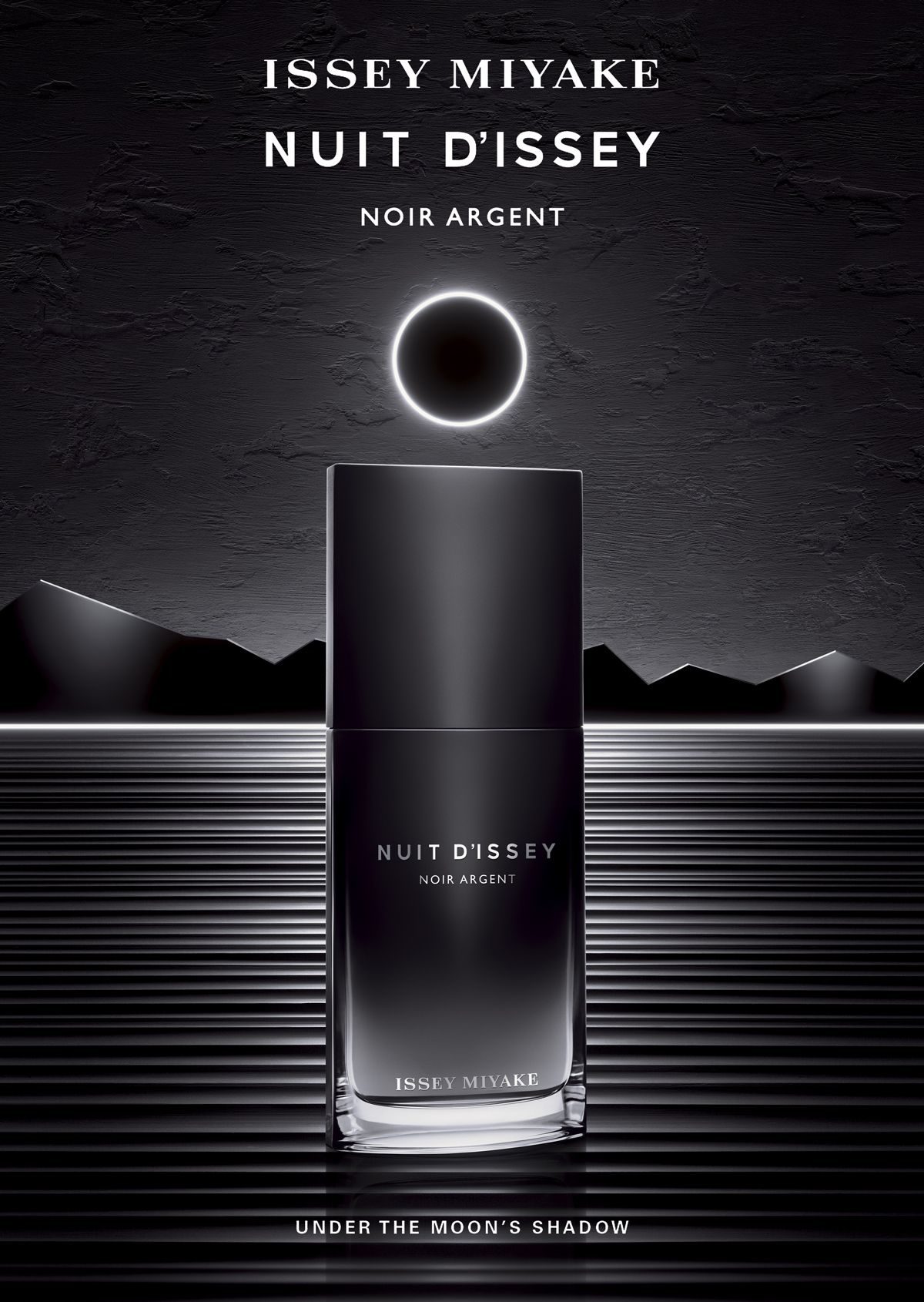 Issey Miyake Nuit D’Issey Noir Argent  The fashion house of Issey Miyake delights its wearers with a new tempting and exquisite fragrance for men, Nuit D’Issey Noir Argent. ‘Under the moon’s shadow’ comes the new perfume’s slogan thus inspiring an intense, long-lasting and an evening masculine perfume for manly-man. Issey Miyake Nuit D’Issey Noir Argent is described as a fresh/woody intense fragrance with a nice and arresting aroma to beckon a woman’s heart. Created by famous perfumer Dominique Ropion and marked by the Shiseido Group, the new fragrance will constantly seduce with its lingering sensuality.     Nuit D’Issey Noir Argent opens with spice notes of pink and black pepper, nutmeg, leather along with woody ingredients of patchouli, wood, myrrh, oriental saffron, and vetiver. Nuit D’Issey Noir Argent follows the original version Nuit D’Issey launched in 2014 and promises to elude the same radiance, elegant aroma as the original fragrance and not to dissatisfy.   Issey Miyake Nuit D’Issey Noir Argent is available in 100ml Eau de Toilette.
